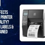 Industrial barcode printer printing labels, showing how ribbons, label material, and DPI affect barcode print quality