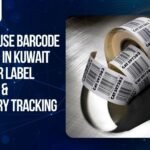 Warehouse barcode system in Kuwait showing barcode printers, scanners, and labeled cartons for inventory tracking and logistics operations