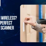 Person using a barcode scanner on warehouse packages illustrating wired vs wireless barcode scanning solutions for inventory management